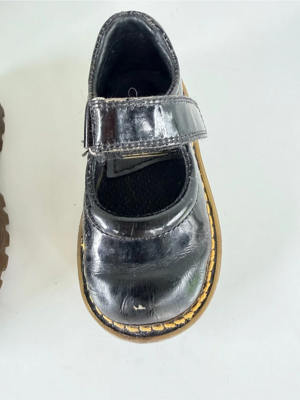 Dr. Martens Kids Black Mary Jane Shoes with Yellow Stitching